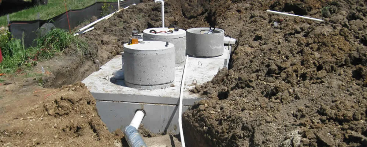 Septic system repair and installation site with tank access ports in Charleston, SC